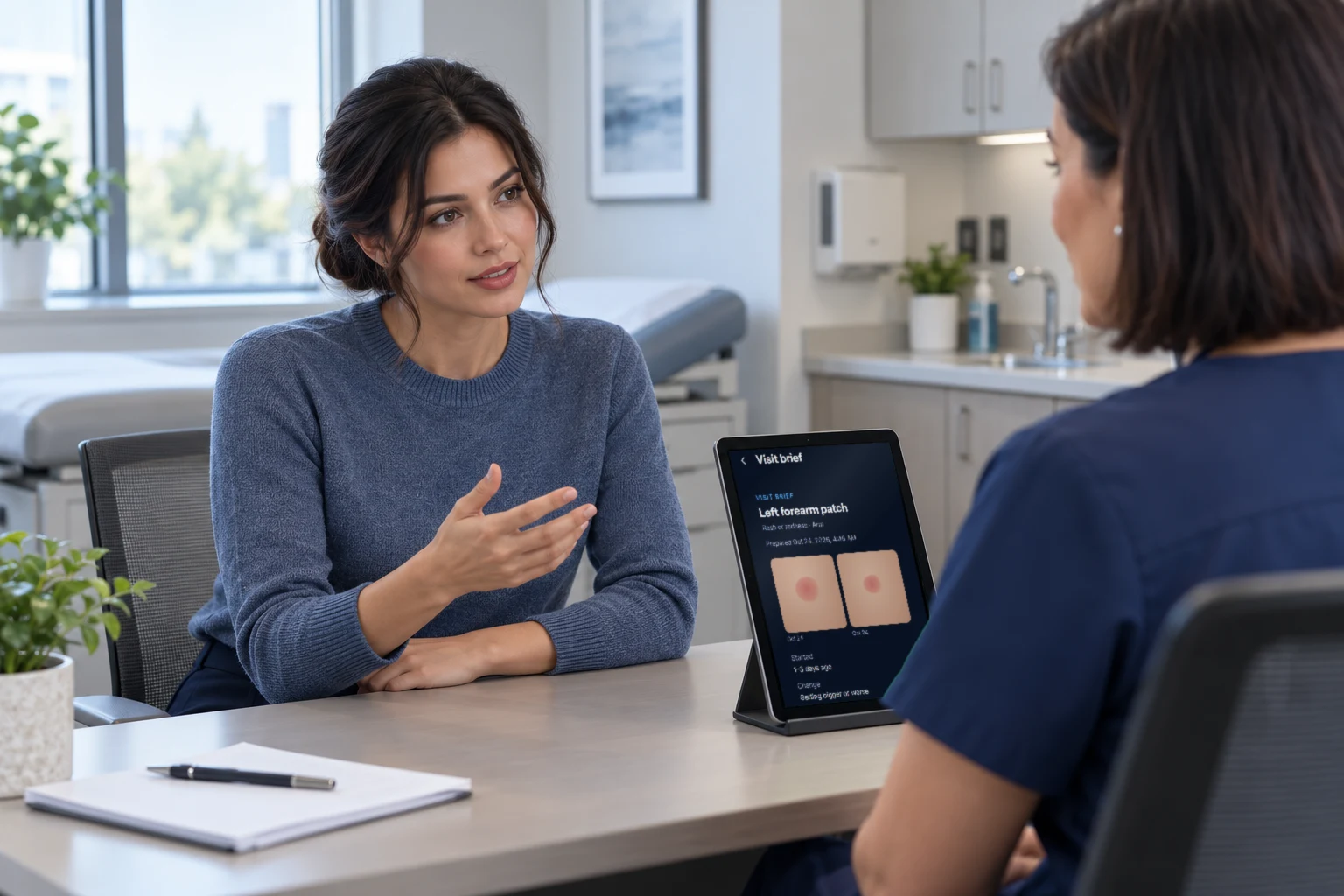 A clinician and a patient talking, with his Visit Brief open on her tablet (illustrative scene)